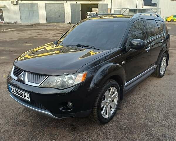 Чорний Міцубісі Аутлендер ХЛ, об'ємом двигуна 2.36 л та пробігом 117 тис. км за 11500 $, фото 1 на Automoto.ua
