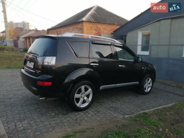 Чорний Міцубісі Аутлендер ХЛ, об'ємом двигуна 2.38 л та пробігом 228 тис. км за 7850 $, фото 3 на Automoto.ua