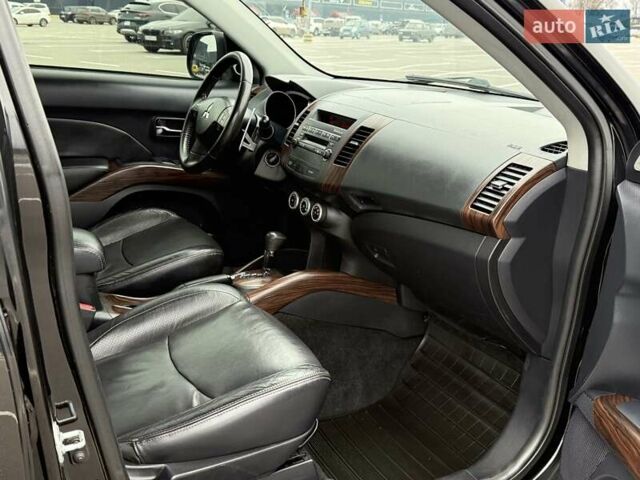 Черный Мицубиси Аутлендер ХЛ, объемом двигателя 2.36 л и пробегом 175 тыс. км за 9700 $, фото 12 на Automoto.ua