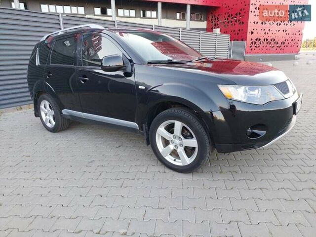 Чорний Міцубісі Аутлендер ХЛ, об'ємом двигуна 2.4 л та пробігом 181 тис. км за 8990 $, фото 6 на Automoto.ua