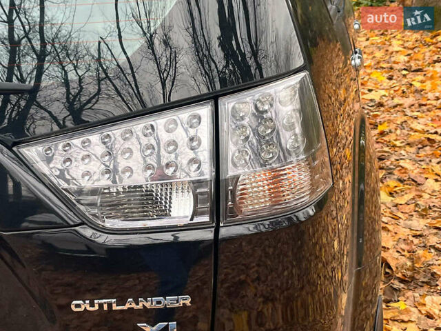 Черный Мицубиси Аутлендер ХЛ, объемом двигателя 3 л и пробегом 285 тыс. км за 9590 $, фото 10 на Automoto.ua