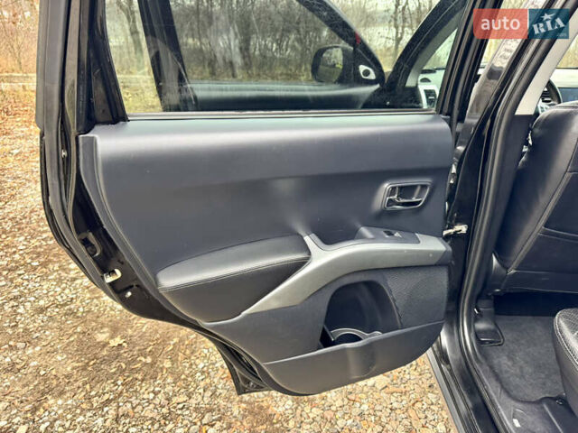 Чорний Міцубісі Аутлендер ХЛ, об'ємом двигуна 2.4 л та пробігом 229 тис. км за 9790 $, фото 15 на Automoto.ua