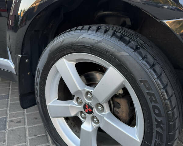 Чорний Міцубісі Аутлендер ХЛ, об'ємом двигуна 3 л та пробігом 243 тис. км за 12500 $, фото 29 на Automoto.ua