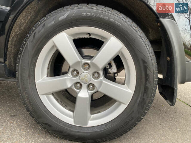 Черный Мицубиси Аутлендер ХЛ, объемом двигателя 3 л и пробегом 154 тыс. км за 8900 $, фото 23 на Automoto.ua