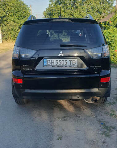 Чорний Міцубісі Аутлендер ХЛ, об'ємом двигуна 2.4 л та пробігом 325 тис. км за 7000 $, фото 3 на Automoto.ua