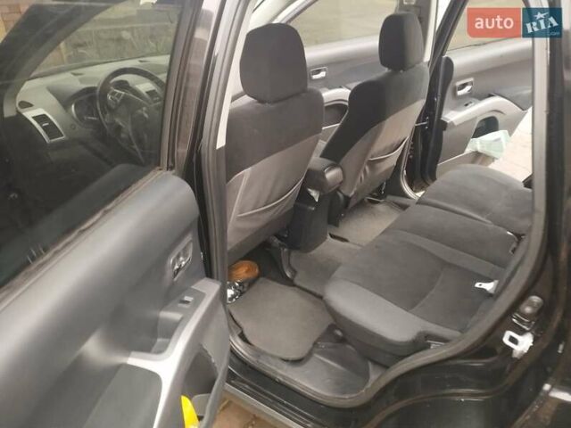 Черный Мицубиси Аутлендер ХЛ, объемом двигателя 2.36 л и пробегом 41 тыс. км за 12000 $, фото 5 на Automoto.ua