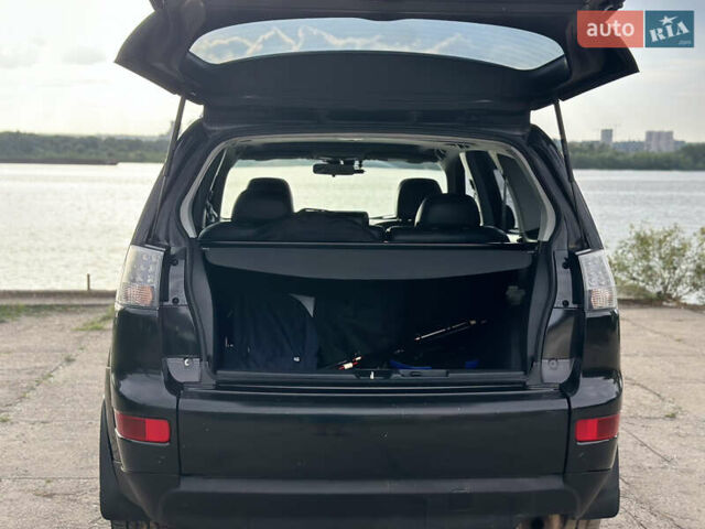 Черный Мицубиси Аутлендер ХЛ, объемом двигателя 2.4 л и пробегом 212 тыс. км за 9350 $, фото 35 на Automoto.ua