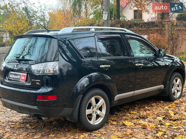 Черный Мицубиси Аутлендер ХЛ, объемом двигателя 3 л и пробегом 285 тыс. км за 9590 $, фото 11 на Automoto.ua