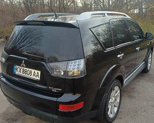 Чорний Міцубісі Аутлендер ХЛ, об'ємом двигуна 2.36 л та пробігом 117 тис. км за 11500 $, фото 7 на Automoto.ua