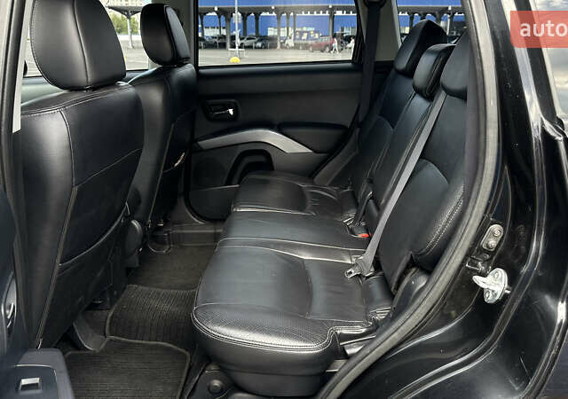 Черный Мицубиси Аутлендер ХЛ, объемом двигателя 2.4 л и пробегом 212 тыс. км за 9350 $, фото 27 на Automoto.ua