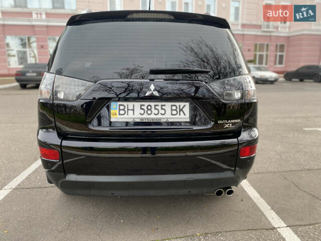 Черный Мицубиси Аутлендер ХЛ, объемом двигателя 3 л и пробегом 154 тыс. км за 8900 $, фото 8 на Automoto.ua