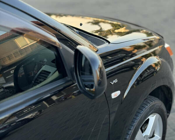 Чорний Міцубісі Аутлендер ХЛ, об'ємом двигуна 3 л та пробігом 243 тис. км за 12500 $, фото 7 на Automoto.ua