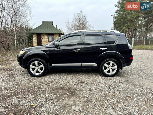 Чорний Міцубісі Аутлендер ХЛ, об'ємом двигуна 2.4 л та пробігом 229 тис. км за 9790 $, фото 3 на Automoto.ua