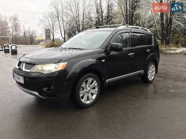 Чорний Міцубісі Аутлендер ХЛ, об'ємом двигуна 2 л та пробігом 306 тис. км за 9799 $, фото 5 на Automoto.ua