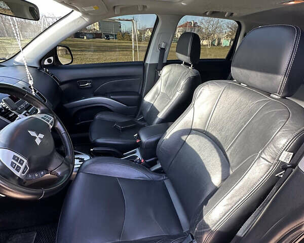 Черный Мицубиси Аутлендер ХЛ, объемом двигателя 2.4 л и пробегом 198 тыс. км за 11000 $, фото 14 на Automoto.ua