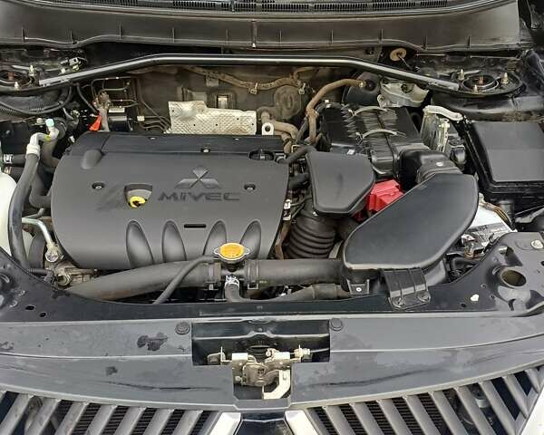 Чорний Міцубісі Аутлендер ХЛ, об'ємом двигуна 2.36 л та пробігом 117 тис. км за 11500 $, фото 6 на Automoto.ua