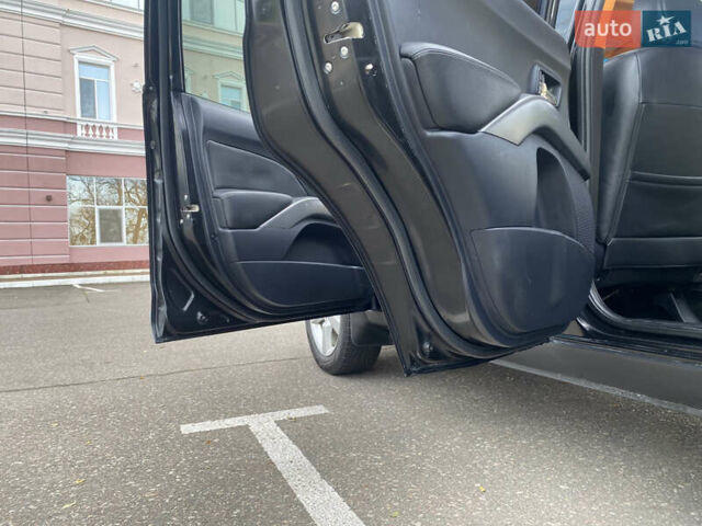 Черный Мицубиси Аутлендер ХЛ, объемом двигателя 3 л и пробегом 154 тыс. км за 8900 $, фото 22 на Automoto.ua