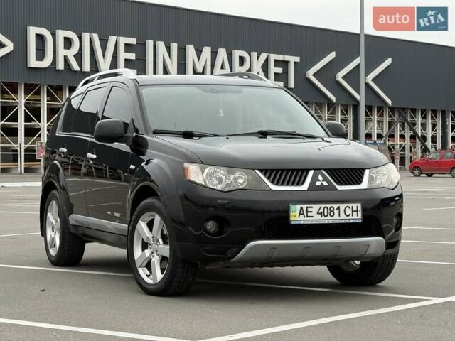 Черный Мицубиси Аутлендер ХЛ, объемом двигателя 2.36 л и пробегом 175 тыс. км за 9700 $, фото 17 на Automoto.ua