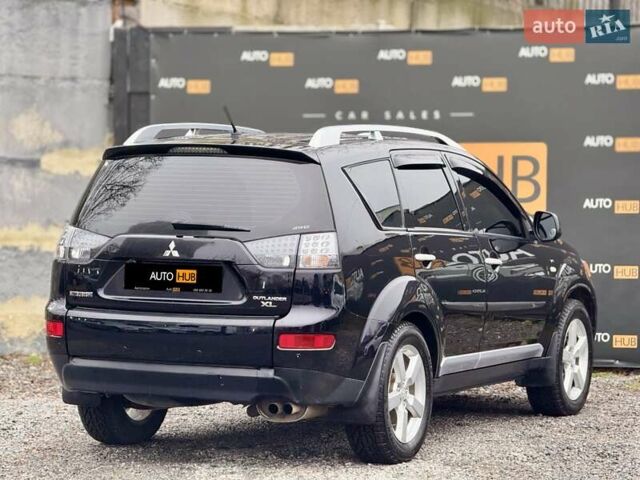 Черный Мицубиси Аутлендер ХЛ, объемом двигателя 3 л и пробегом 214 тыс. км за 9500 $, фото 7 на Automoto.ua