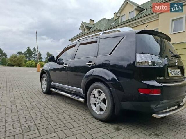 Черный Мицубиси Аутлендер ХЛ, объемом двигателя 2.4 л и пробегом 127 тыс. км за 10500 $, фото 11 на Automoto.ua