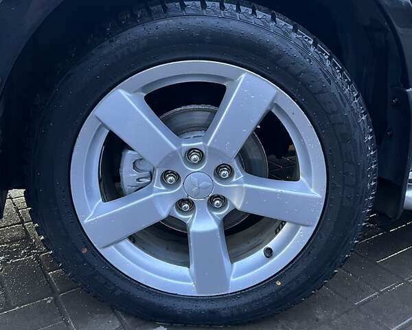 Чорний Міцубісі Аутлендер ХЛ, об'ємом двигуна 2.36 л та пробігом 230 тис. км за 9400 $, фото 6 на Automoto.ua