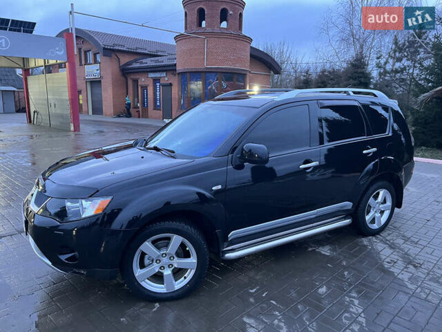 Чорний Міцубісі Аутлендер ХЛ, об'ємом двигуна 2.36 л та пробігом 230 тис. км за 9400 $, фото 5 на Automoto.ua