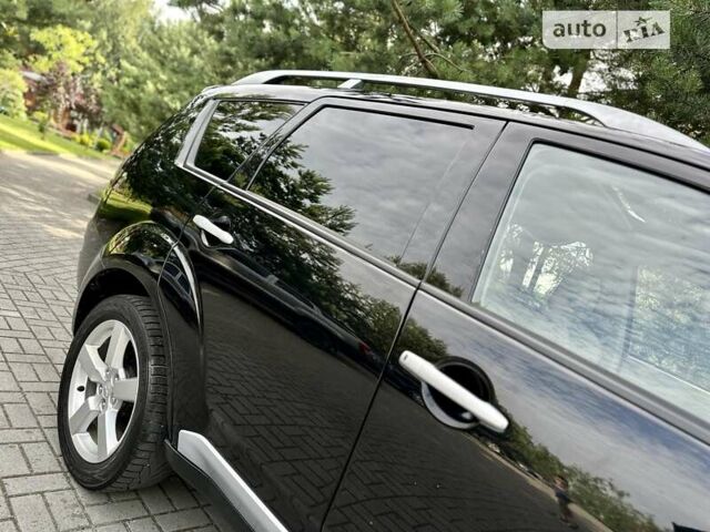 Чорний Міцубісі Аутлендер ХЛ, об'ємом двигуна 2 л та пробігом 172 тис. км за 9350 $, фото 14 на Automoto.ua