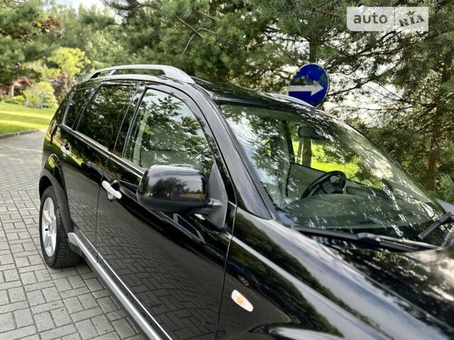 Чорний Міцубісі Аутлендер ХЛ, об'ємом двигуна 2 л та пробігом 172 тис. км за 9350 $, фото 10 на Automoto.ua