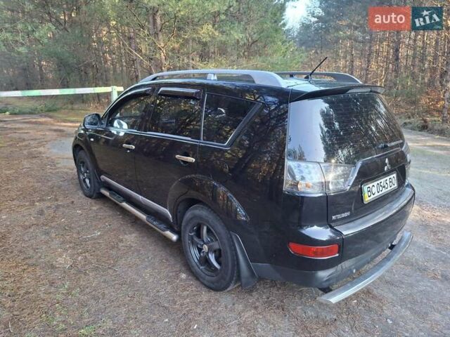 Черный Мицубиси Аутлендер ХЛ, объемом двигателя 2.4 л и пробегом 127 тыс. км за 10500 $, фото 21 на Automoto.ua