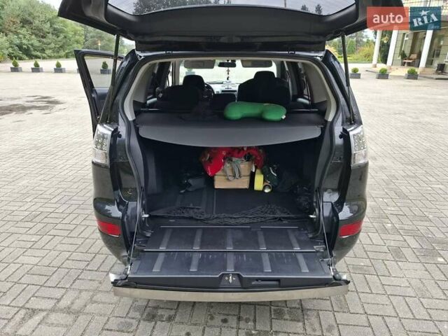 Черный Мицубиси Аутлендер ХЛ, объемом двигателя 2.4 л и пробегом 127 тыс. км за 10500 $, фото 14 на Automoto.ua