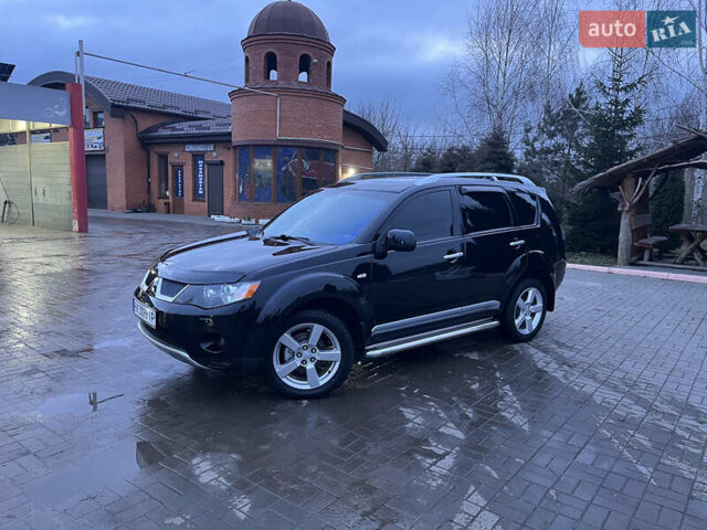 Чорний Міцубісі Аутлендер ХЛ, об'ємом двигуна 2.36 л та пробігом 230 тис. км за 9400 $, фото 21 на Automoto.ua