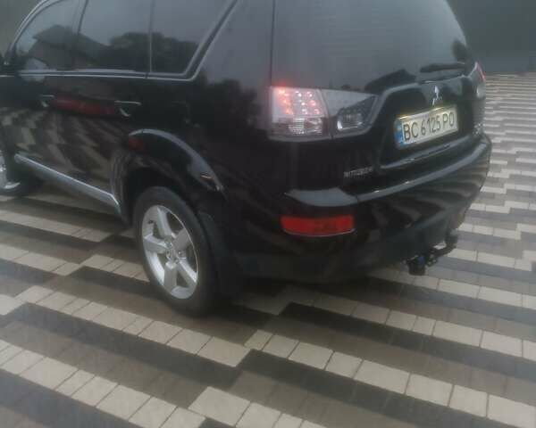 Черный Мицубиси Аутлендер ХЛ, объемом двигателя 2.36 л и пробегом 270 тыс. км за 9200 $, фото 23 на Automoto.ua