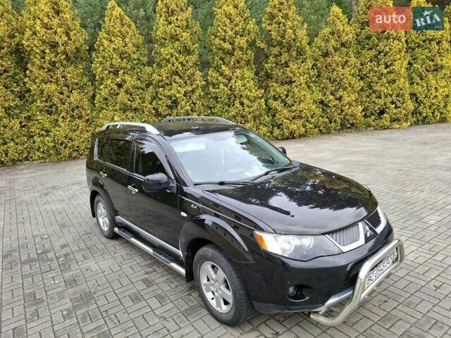Черный Мицубиси Аутлендер ХЛ, объемом двигателя 2.4 л и пробегом 127 тыс. км за 10500 $, фото 5 на Automoto.ua