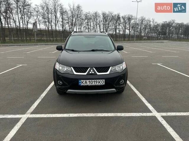 Черный Мицубиси Аутлендер ХЛ, объемом двигателя 2.36 л и пробегом 250 тыс. км за 10000 $, фото 5 на Automoto.ua