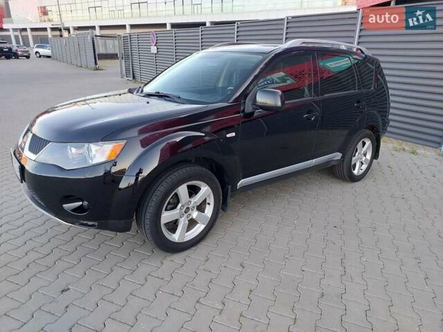Чорний Міцубісі Аутлендер ХЛ, об'ємом двигуна 2.4 л та пробігом 181 тис. км за 8990 $, фото 7 на Automoto.ua