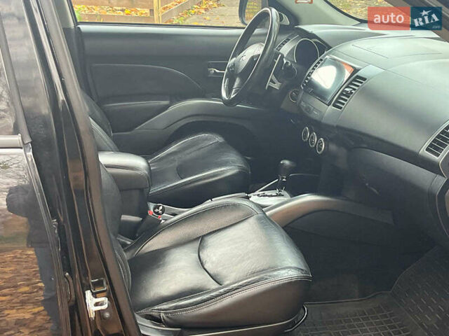 Черный Мицубиси Аутлендер ХЛ, объемом двигателя 3 л и пробегом 285 тыс. км за 9590 $, фото 13 на Automoto.ua