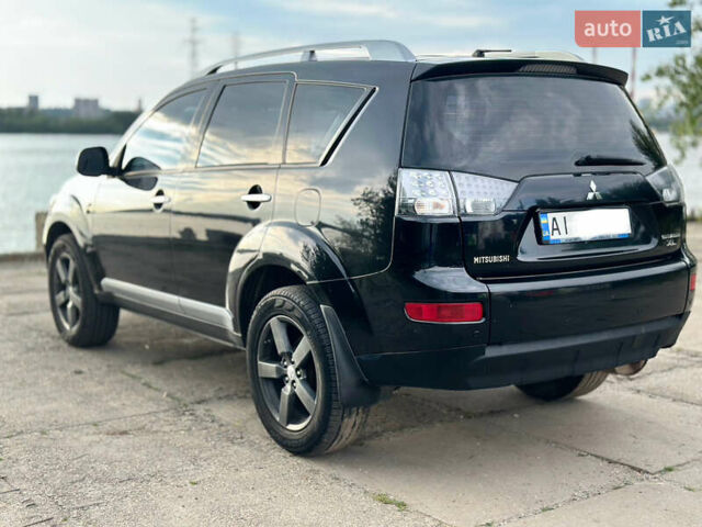 Черный Мицубиси Аутлендер ХЛ, объемом двигателя 2.4 л и пробегом 212 тыс. км за 9350 $, фото 38 на Automoto.ua