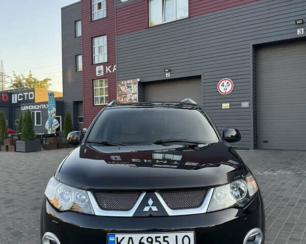 Чорний Міцубісі Аутлендер ХЛ, об'ємом двигуна 3 л та пробігом 243 тис. км за 12500 $, фото 1 на Automoto.ua