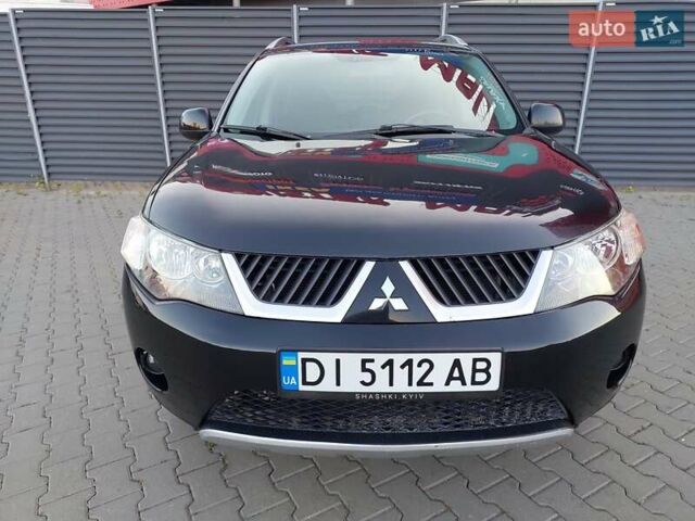 Чорний Міцубісі Аутлендер ХЛ, об'ємом двигуна 2.4 л та пробігом 181 тис. км за 8990 $, фото 2 на Automoto.ua
