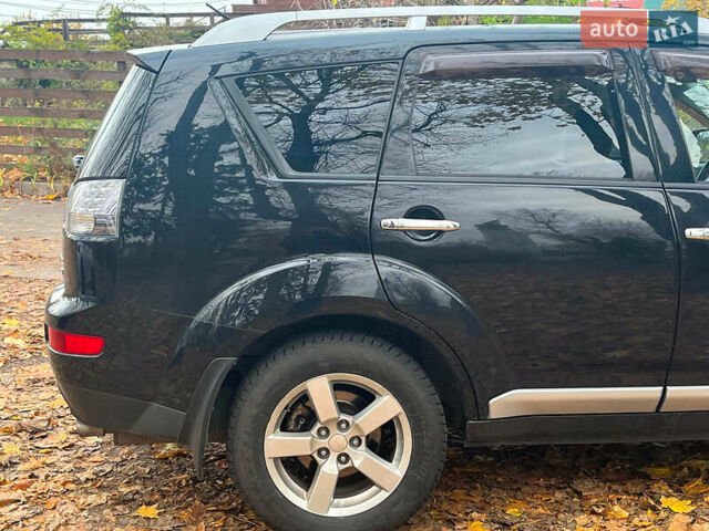 Черный Мицубиси Аутлендер ХЛ, объемом двигателя 3 л и пробегом 285 тыс. км за 9590 $, фото 12 на Automoto.ua
