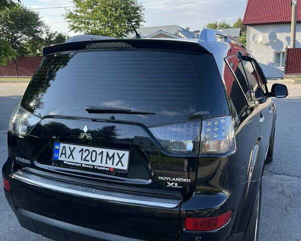 Черный Мицубиси Аутлендер ХЛ, объемом двигателя 2.99 л и пробегом 153 тыс. км за 10800 $, фото 18 на Automoto.ua