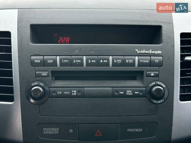 Черный Мицубиси Аутлендер ХЛ, объемом двигателя 2.4 л и пробегом 212 тыс. км за 9350 $, фото 14 на Automoto.ua