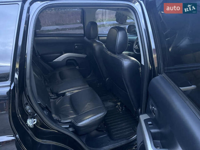 Чорний Міцубісі Аутлендер ХЛ, об'ємом двигуна 2.36 л та пробігом 230 тис. км за 9400 $, фото 18 на Automoto.ua