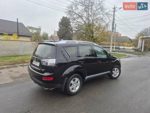 Черный Мицубиси Аутлендер ХЛ, объемом двигателя 2.36 л и пробегом 87 тыс. км за 11500 $, фото 16 на Automoto.ua