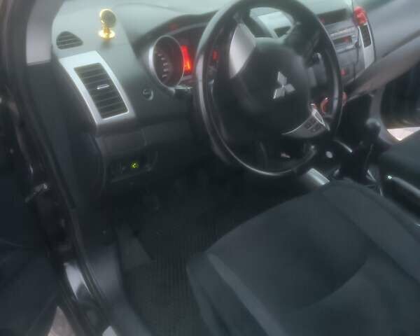 Черный Мицубиси Аутлендер ХЛ, объемом двигателя 2.36 л и пробегом 270 тыс. км за 9200 $, фото 34 на Automoto.ua