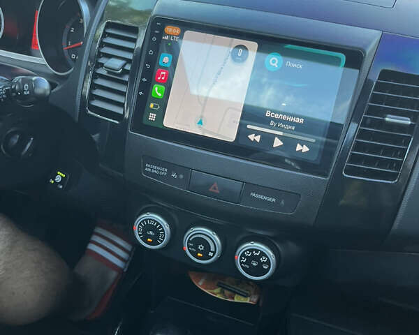 Черный Мицубиси Аутлендер ХЛ, объемом двигателя 2.99 л и пробегом 153 тыс. км за 10800 $, фото 4 на Automoto.ua