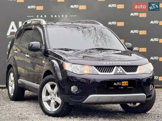 Черный Мицубиси Аутлендер ХЛ, объемом двигателя 3 л и пробегом 214 тыс. км за 9500 $, фото 1 на Automoto.ua