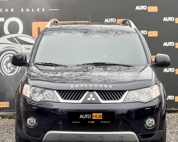 Черный Мицубиси Аутлендер ХЛ, объемом двигателя 3 л и пробегом 214 тыс. км за 9500 $, фото 3 на Automoto.ua