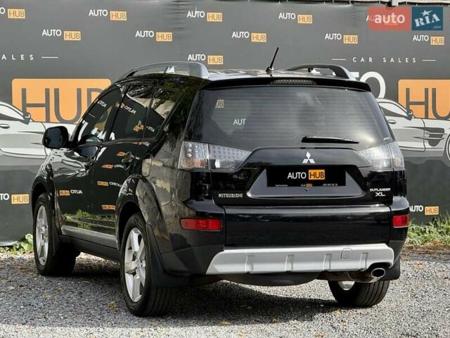 Чорний Міцубісі Аутлендер ХЛ, об'ємом двигуна 2.4 л та пробігом 104 тис. км за 10800 $, фото 3 на Automoto.ua