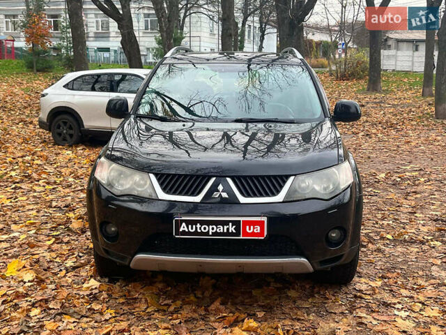 Черный Мицубиси Аутлендер ХЛ, объемом двигателя 3 л и пробегом 285 тыс. км за 9590 $, фото 1 на Automoto.ua